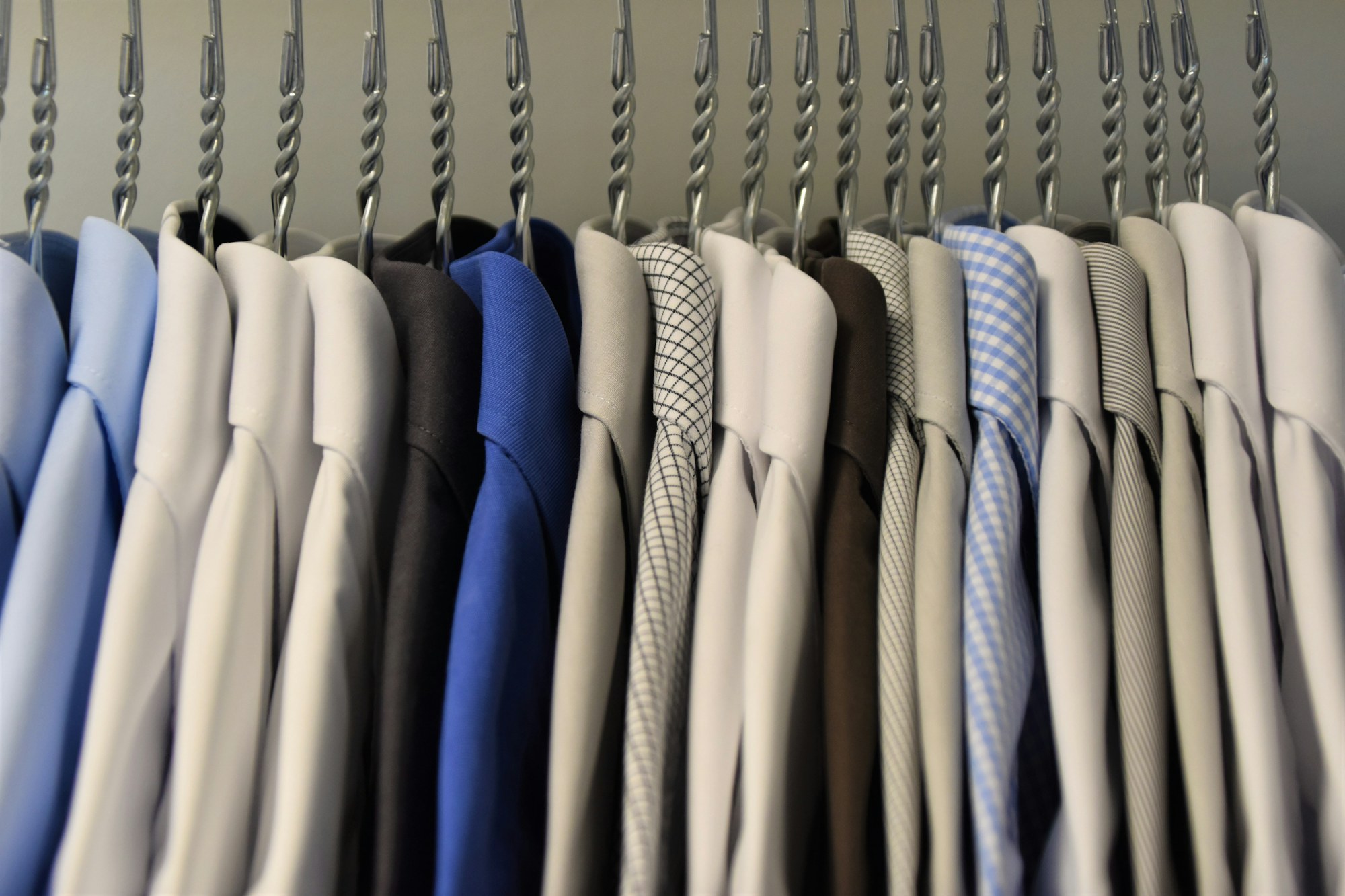 Pressed, on a hanger and ready to wear